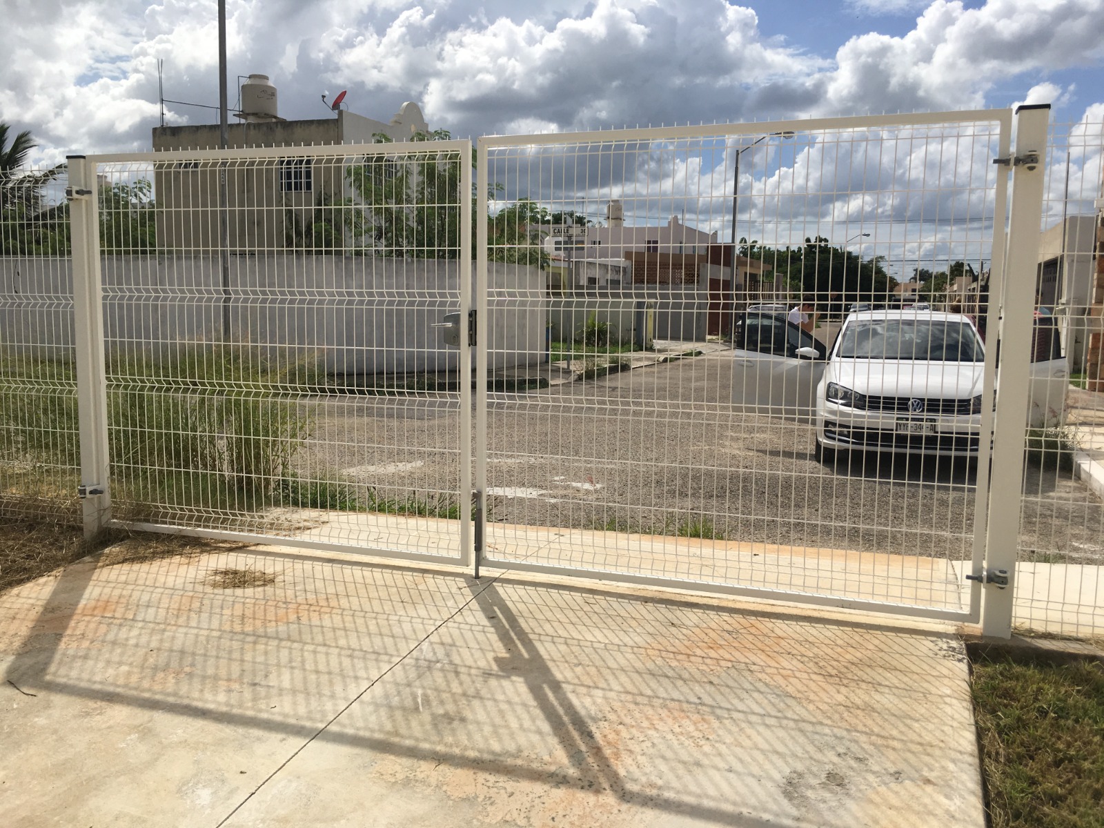 Portón Abatible en 2 hoja Locinox